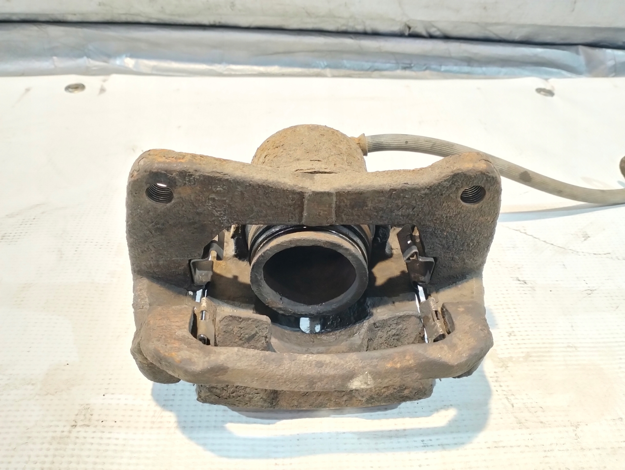 TOYOTA COROLLA E12 IX 2002r 1.4 16V caliper brake right front