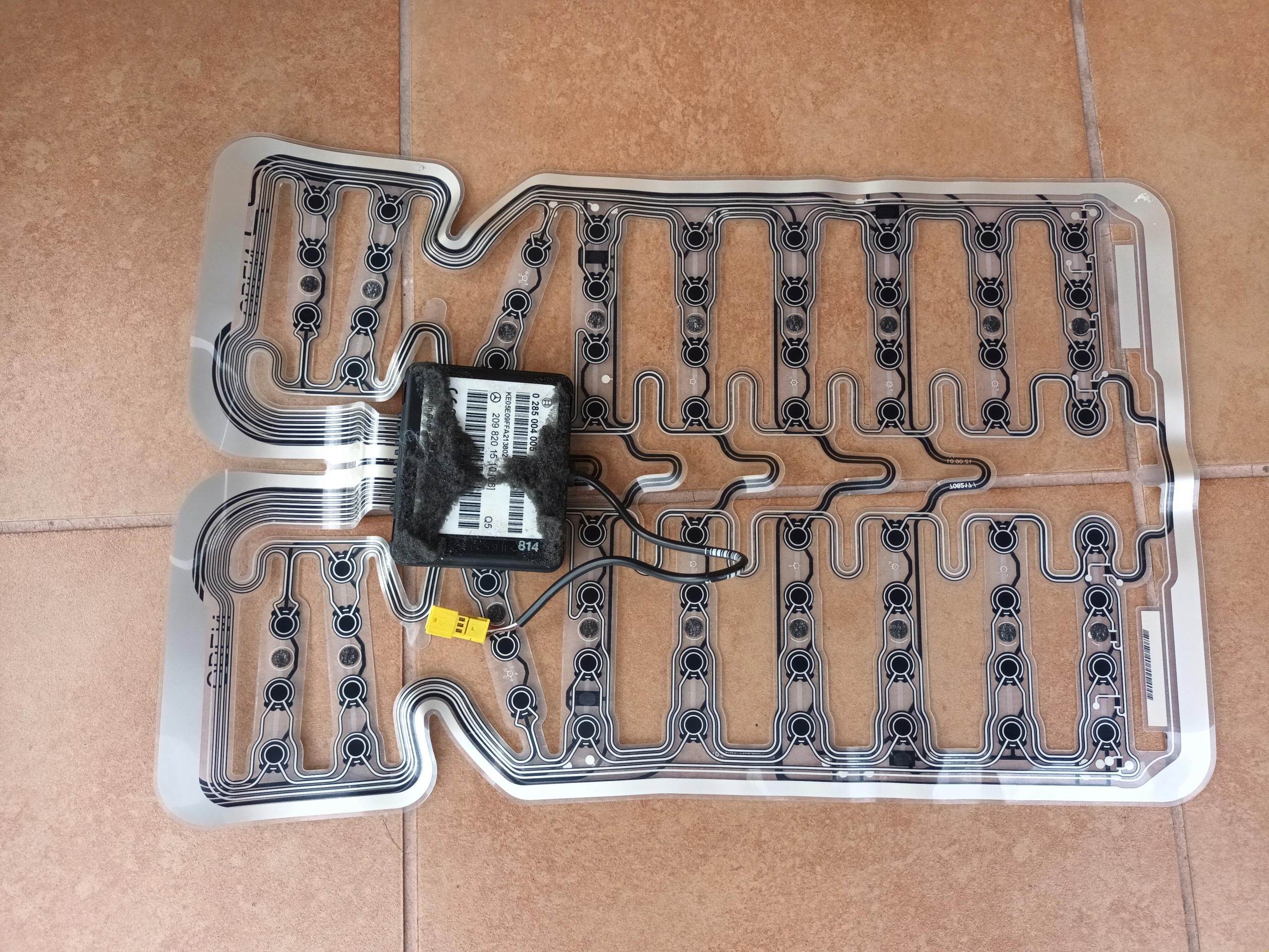 Килимок для сидіння MERCEDES W209 CLK 2098201510