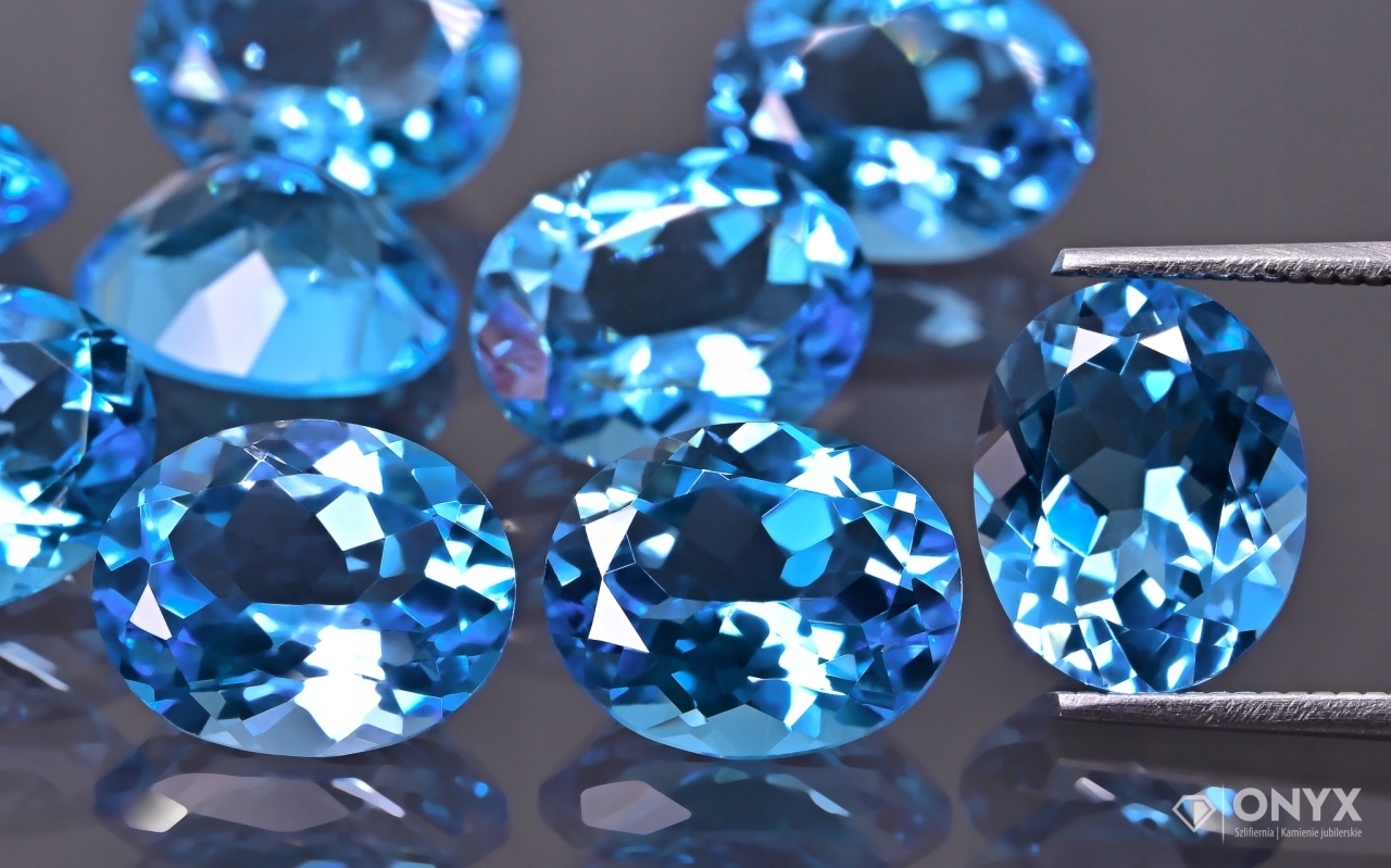 Topaz Swiss Blue fazetovaný ovál 9x7 mm