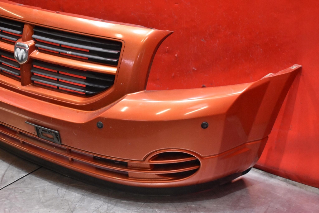 bumper front front POMARANCZOWY PDC DODGE CALIBER 1 and 06-12