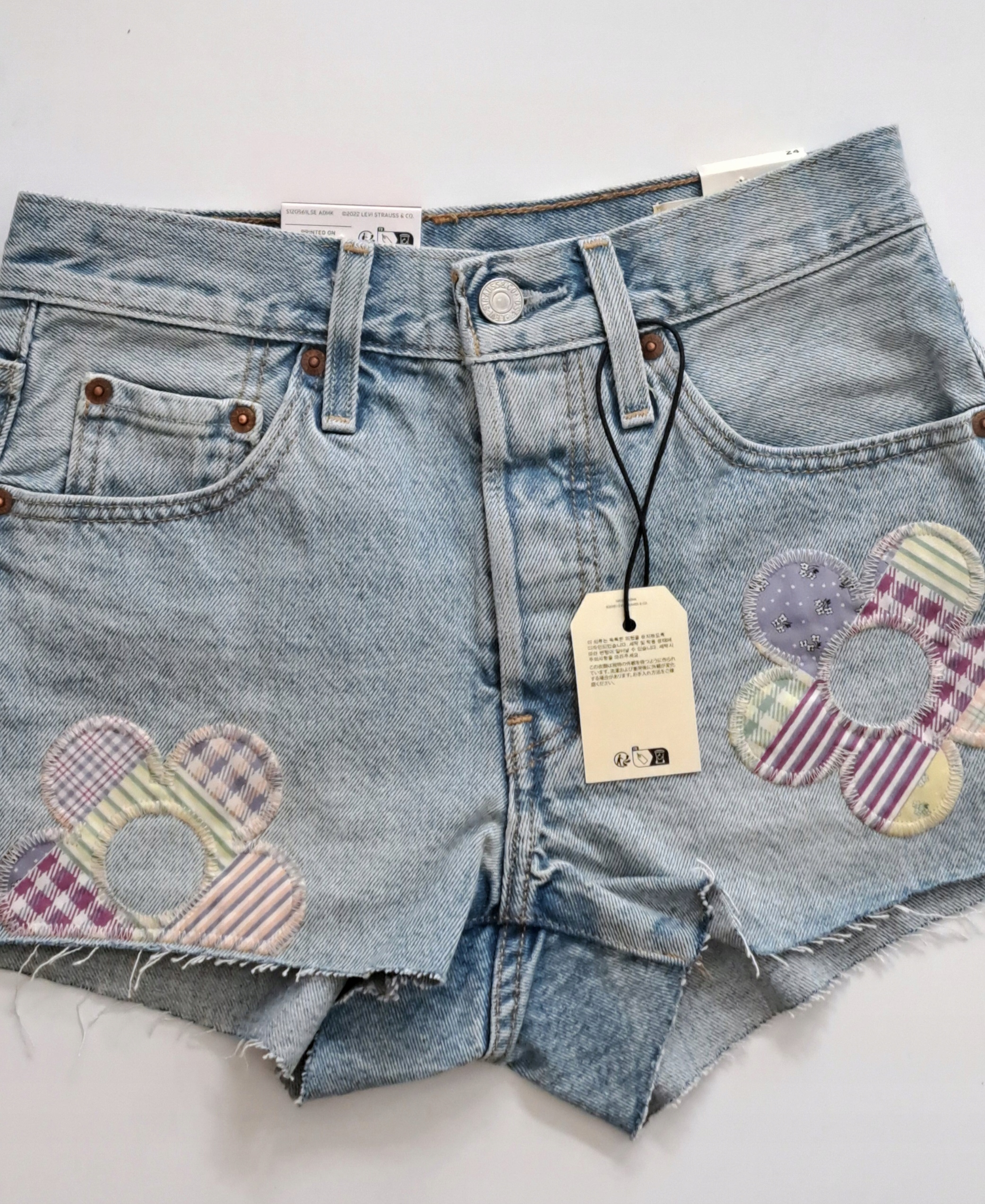 Kraťasy džínové kraťasy Levi's 501 Vel. 24, kraťasy s modrými květy Vel. 24