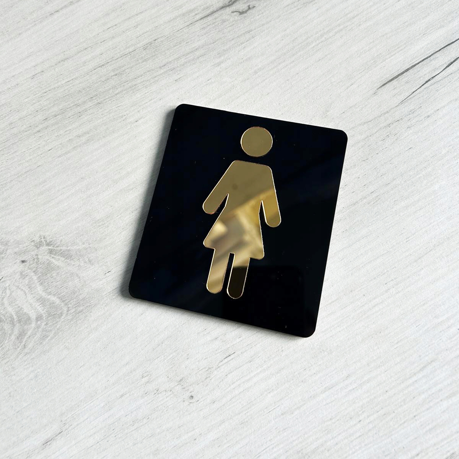 Oznaczenie na drzwi WC DAMSKIE tabliczka informacyjna CZARNA złoty pikto Kod producenta O28