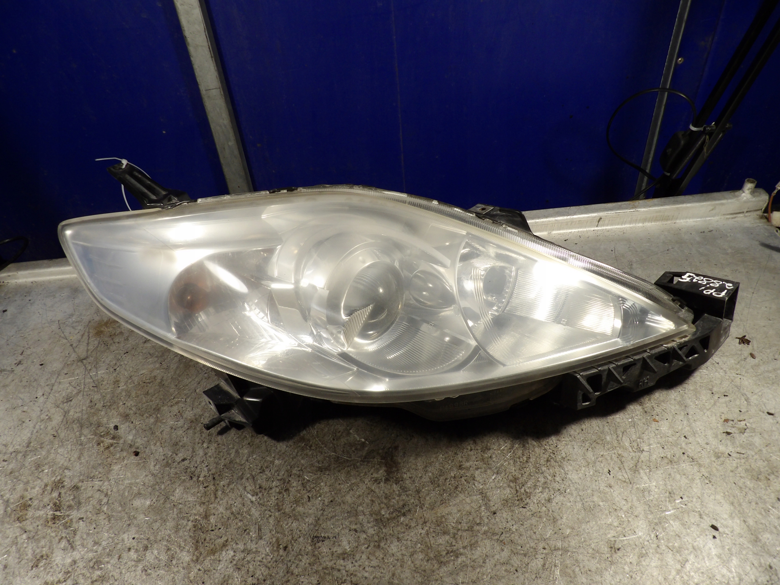 Mazda 5 light front right lens P5115R