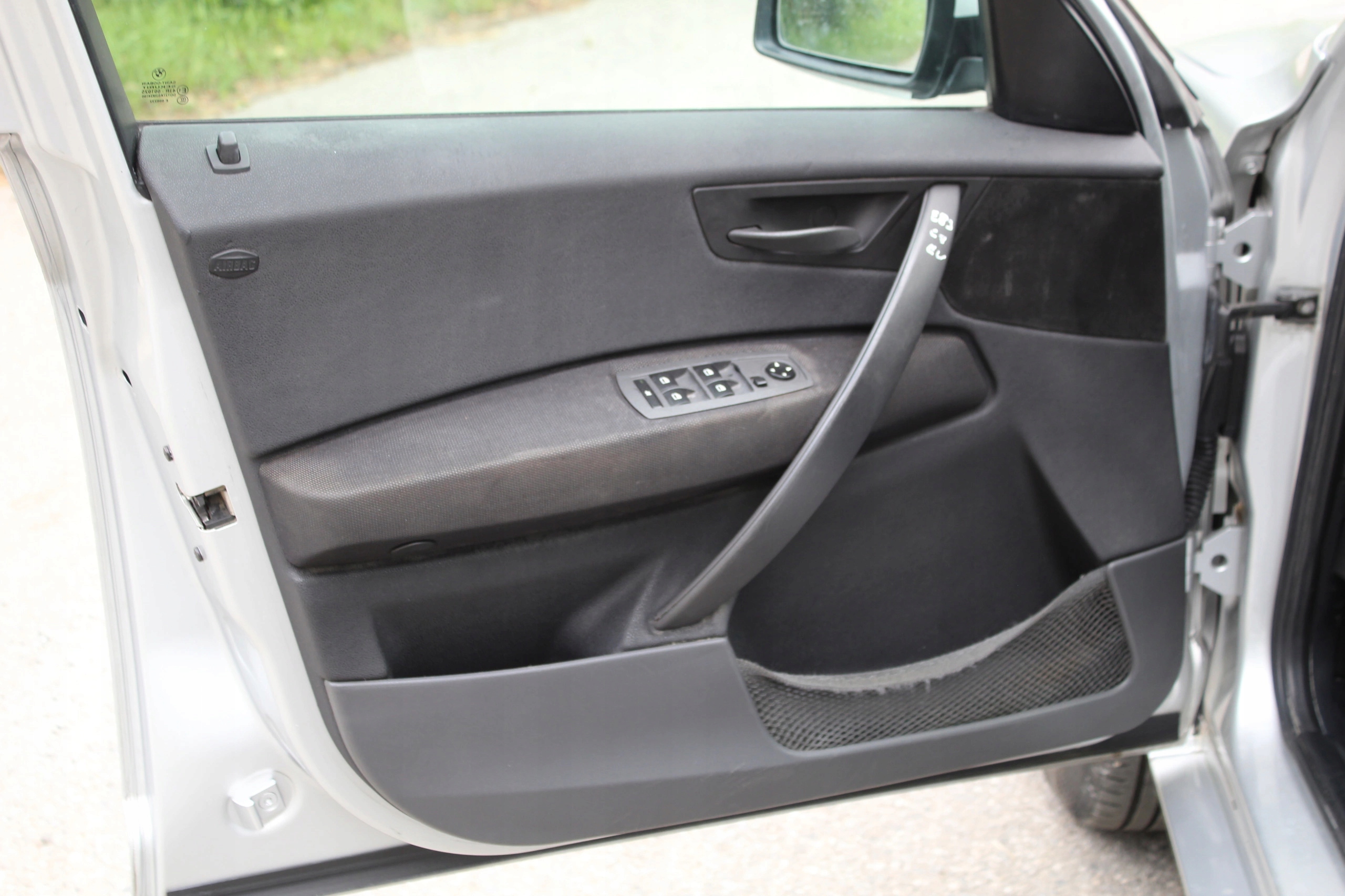 ОБШИВКА ДВЕРІ ЛІВИЙ ПЕРЕД BMW X3 E83 ЄВРОПА