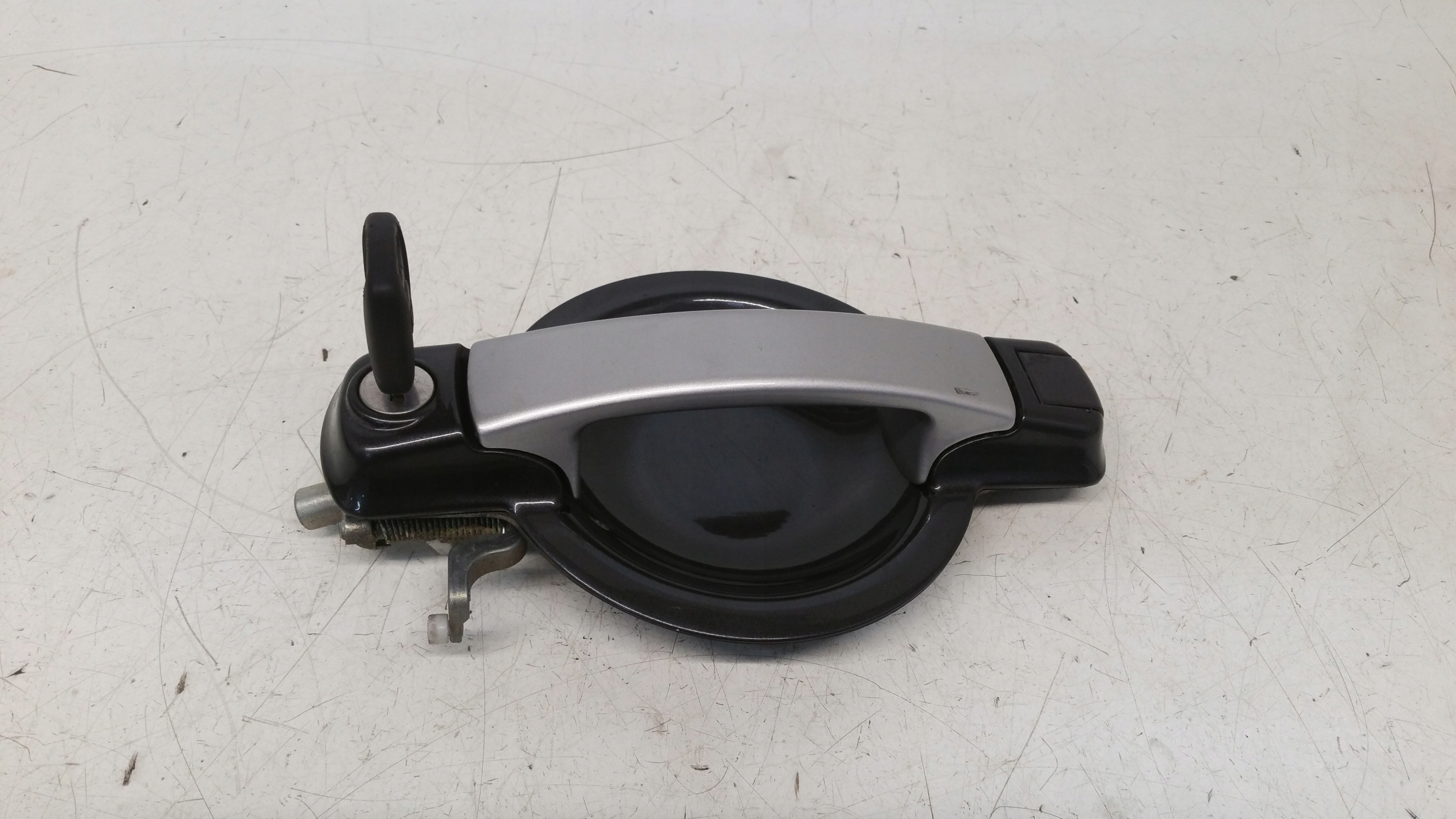 handle key left front Fiat Doblo II