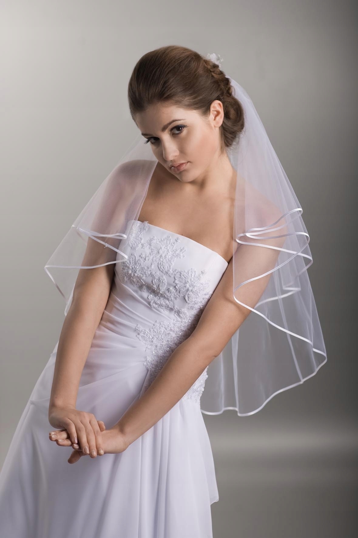 

Welon ślubny W-5 Ivory obszyty lamówką