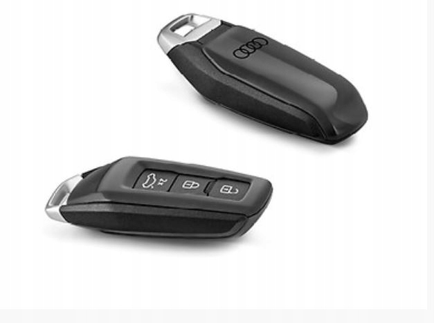 ^Originálny kryt na kľúčik v šedej farbe magnát s krúžkami Audi