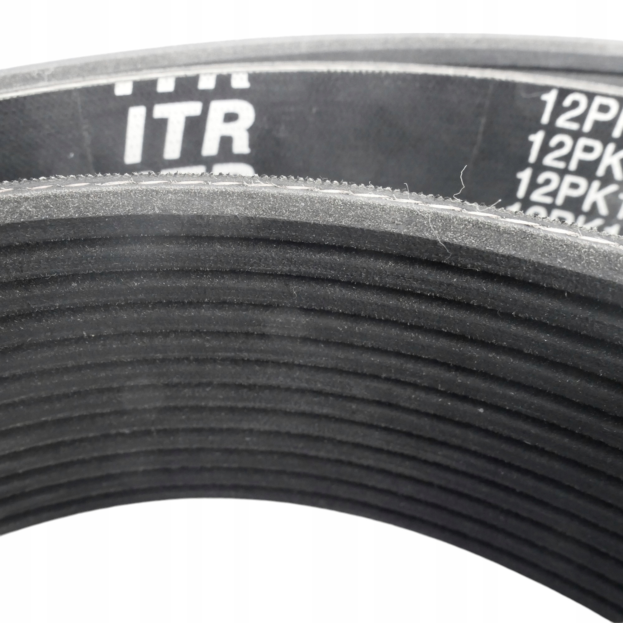 Vroubkovaný pásek Caterpillar 321C