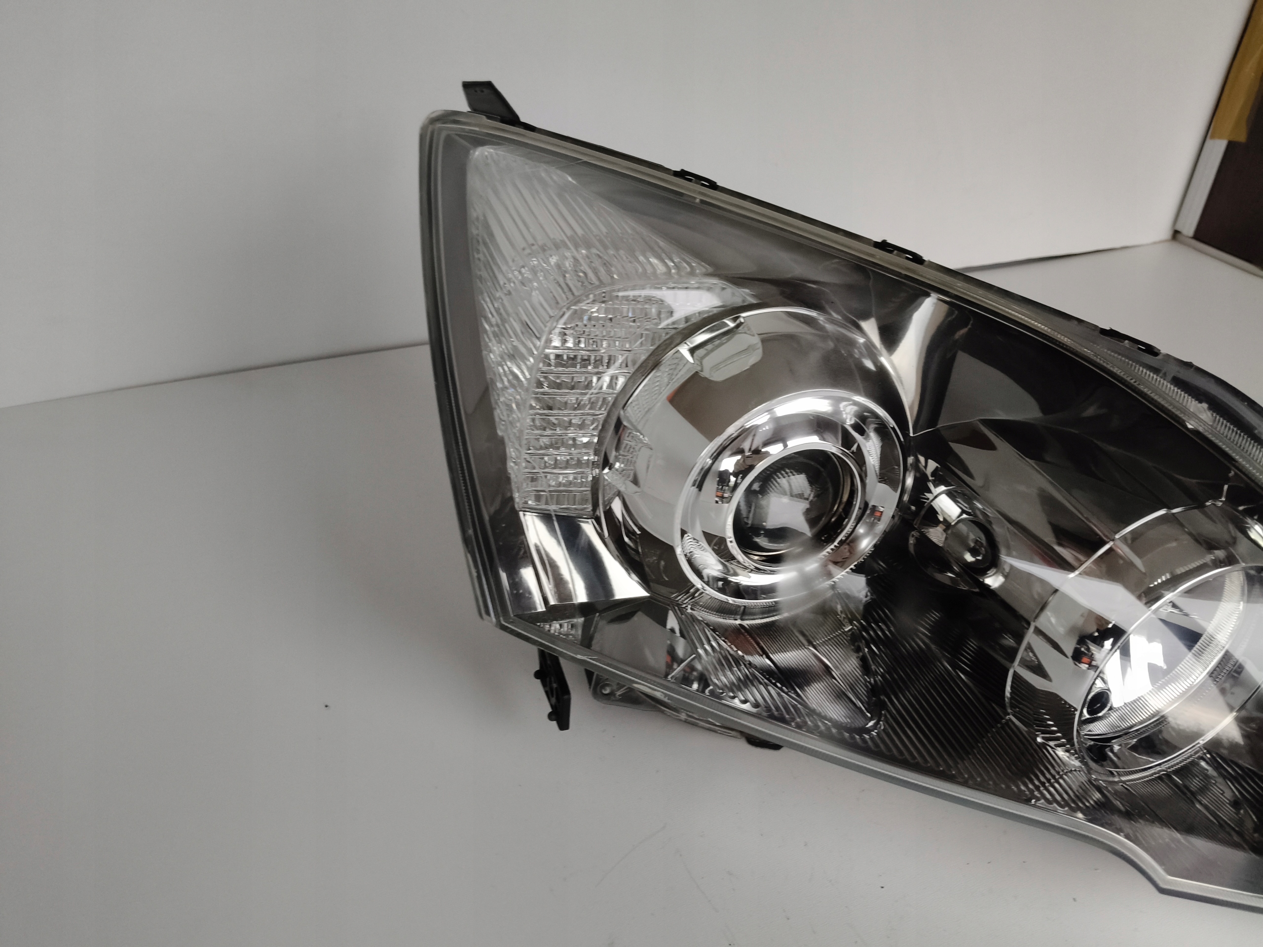 light right REFLEKTOR HONDA CRV III 06