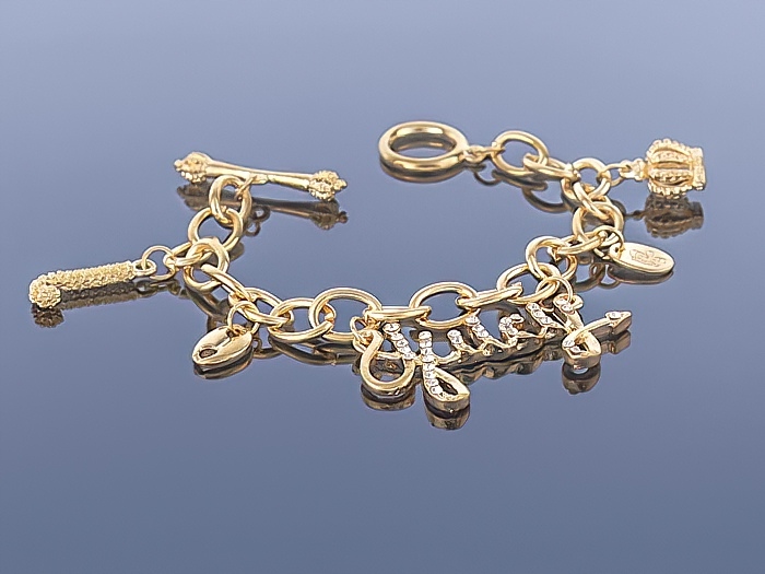 

Złota bransoletka Charms