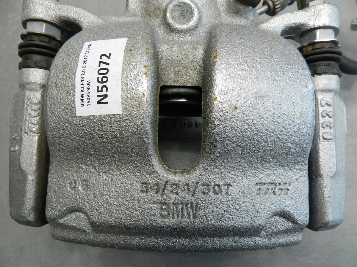 BMW X1 F48 2.0 d caliper left front 6860265