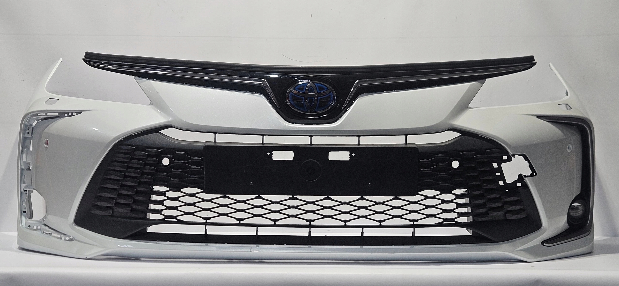 front bumper grille TOYOTA COROLLA E21 sedan LIFT 22- PDC washers 52119