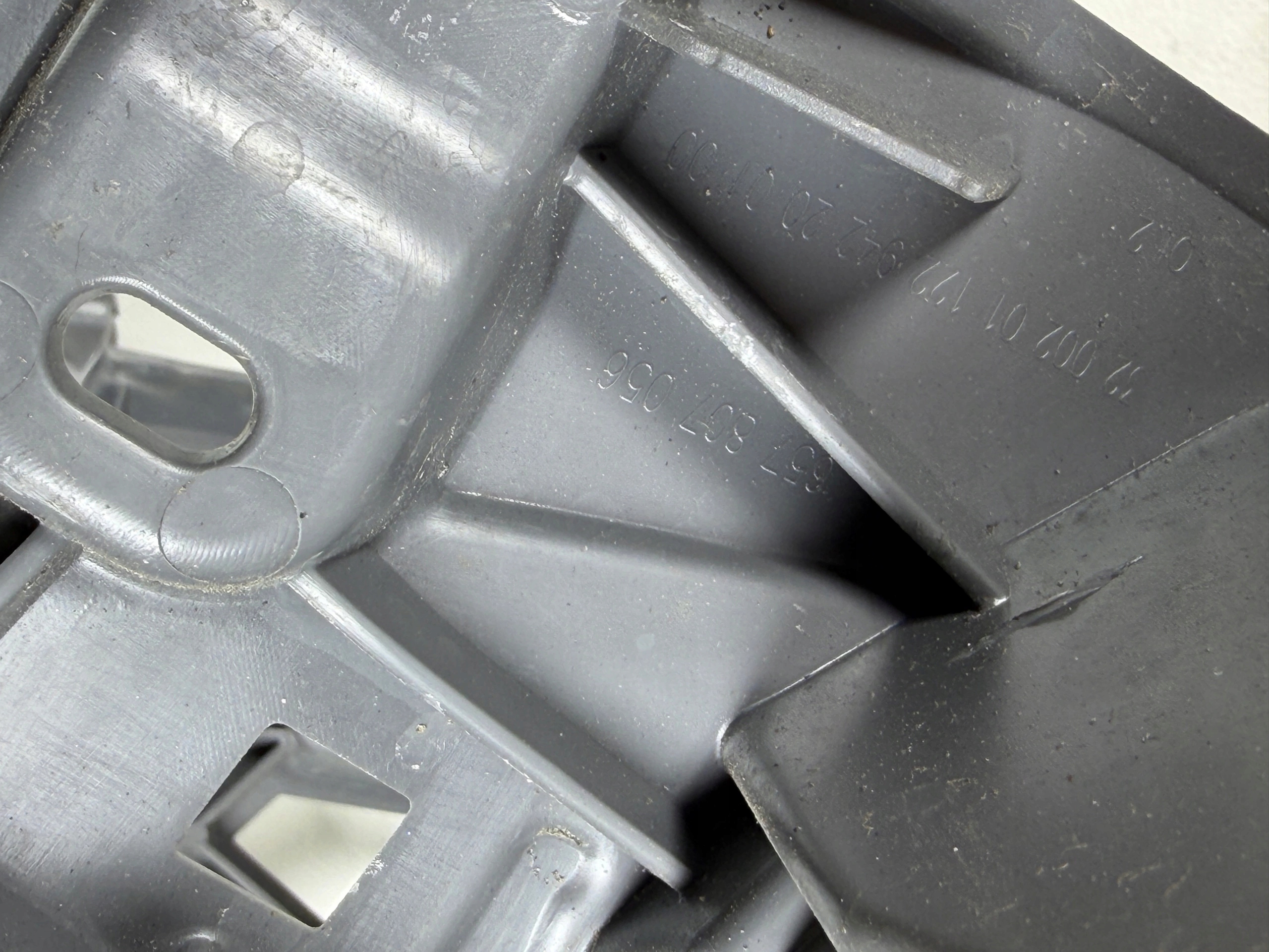 SKODA SCALA 2019- support holder of the washer left right front 657807055 6