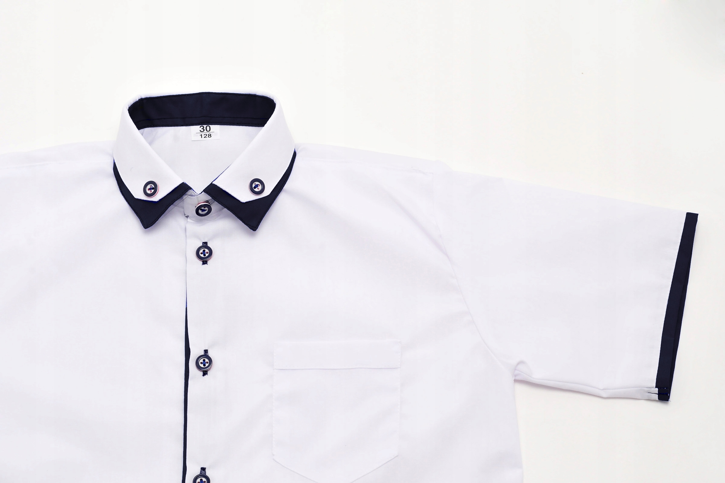 KOSZULA CHŁOPIĘCA BIAŁA Z KRÓTKIM I Z OBSZYCIEM RĘKAWEM ELEGANCKA 140 Rozmiar (new) 140 (135 - 140 cm)