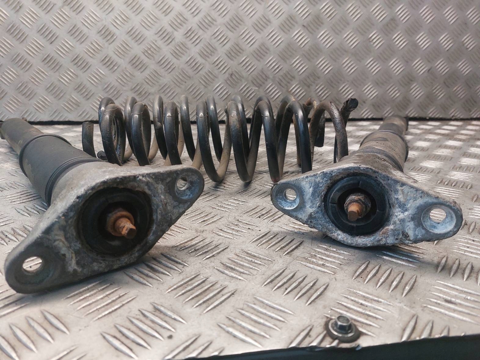shock absorber + spring left rear part + right rear part KIA PROCEED and 55310-1H001
