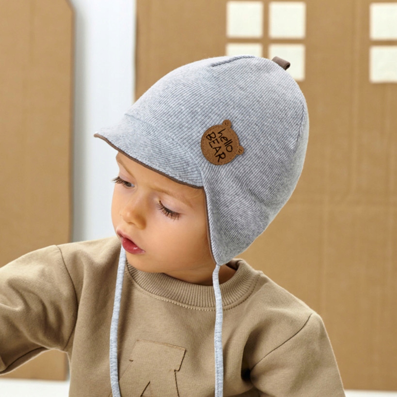 CZAPKA CHŁOPIĘCA Z DASZKIEM WIĄZANA BAWEŁNIANA PRĄŻEK polska r 52 54 Marka Ajs