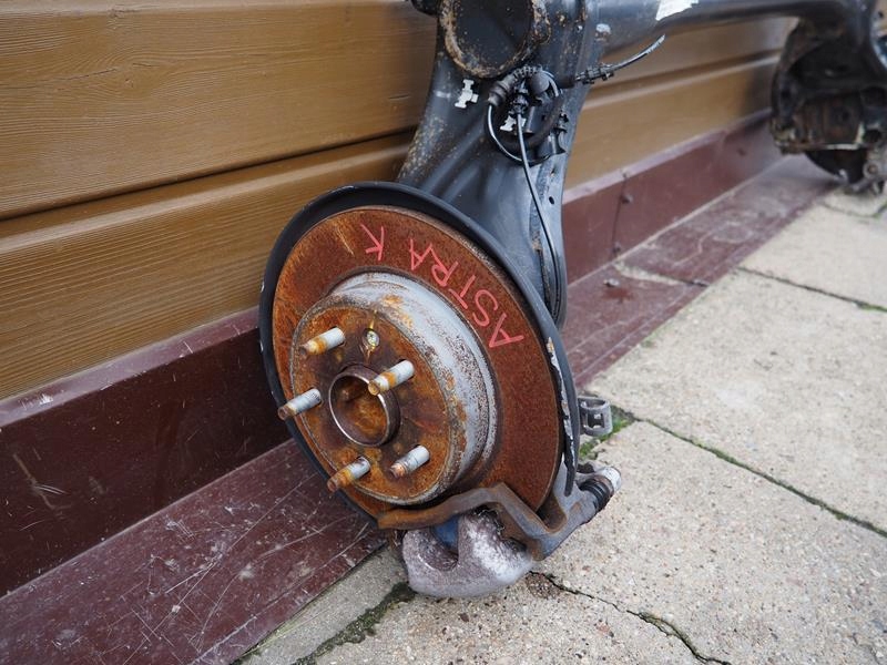 OŚ BELKA TYLNA TARCZE OPEL ASTRA V K Numer katalogowy części OŚ TYŁ ASTRA V K