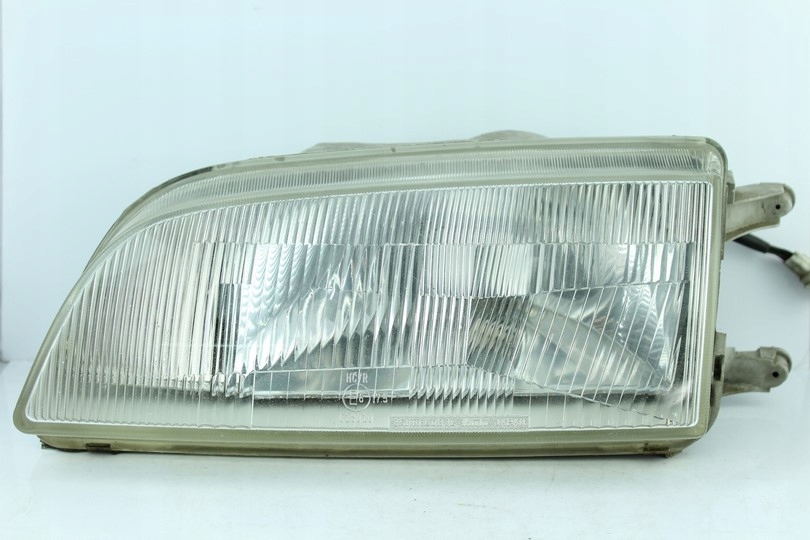 REFLEKTOR light front SUZUKI SWIFT left 11032272 KOITO