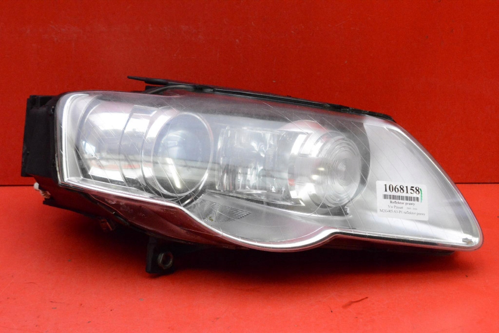 REFLEKTOR right light front lens XENON EU 89312669 VW PASSAT B6 05-10
