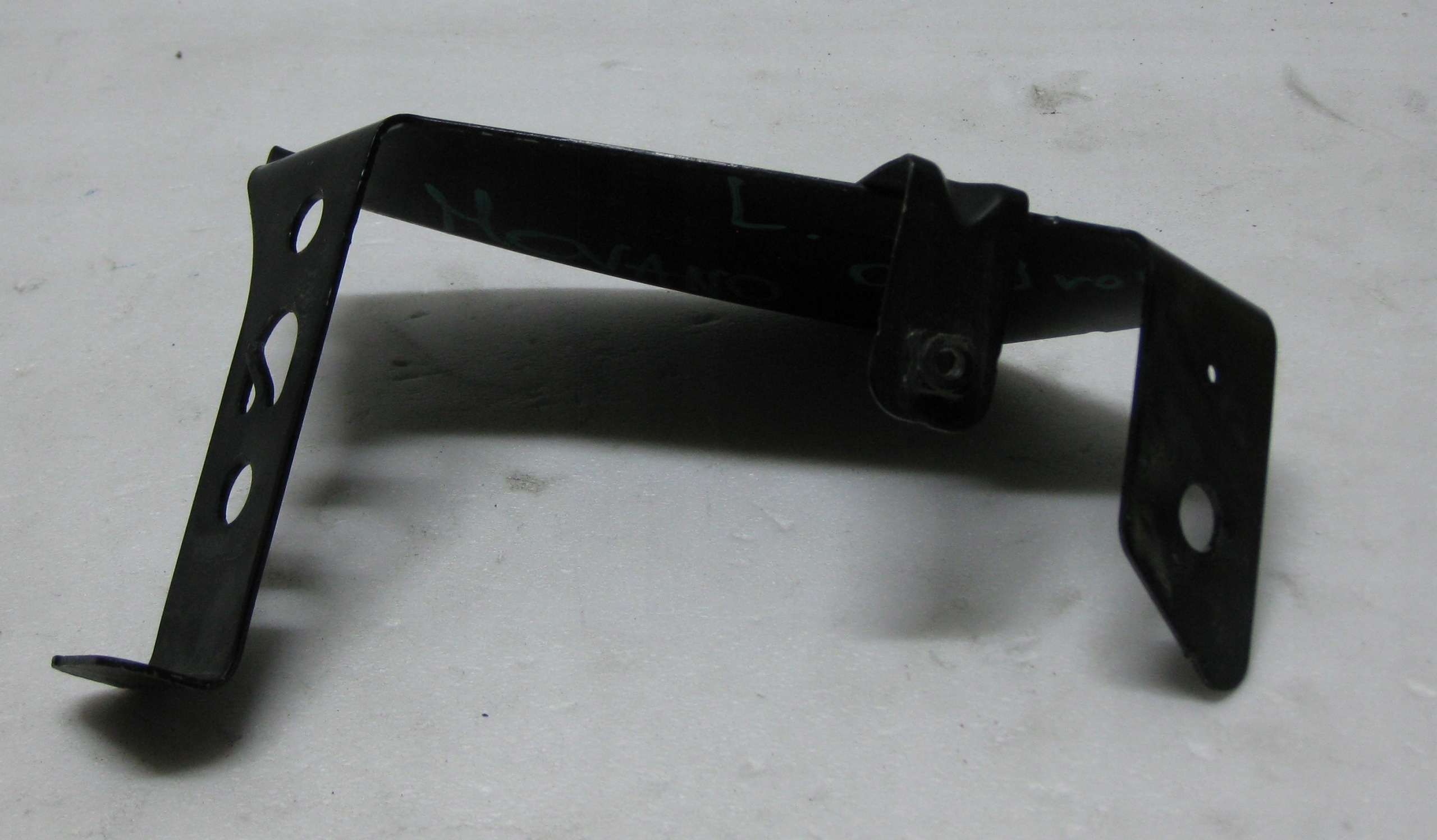 RENAULT MASTER III left holder of a bumper front 764216334R