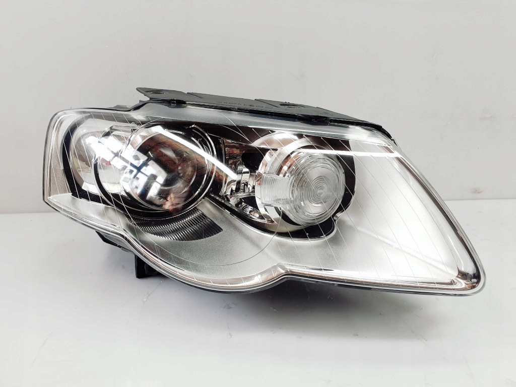 VW PASSAT B6 3C0 05-08r PRAWA LAMPA PRZÓD XENON EU