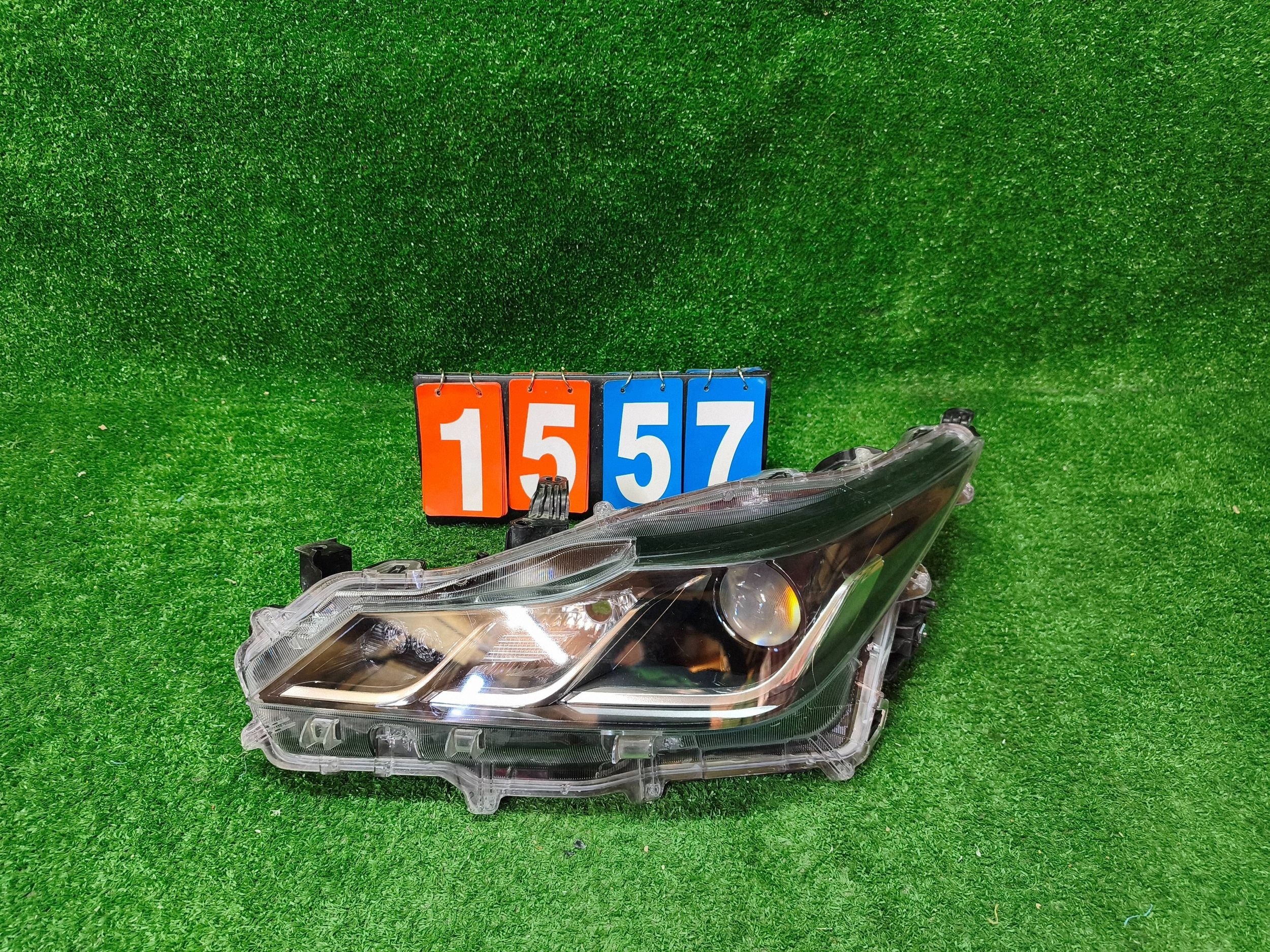 REFLEKTOR left front TOYOTA COROLLA E21 sedan LED NR.1557