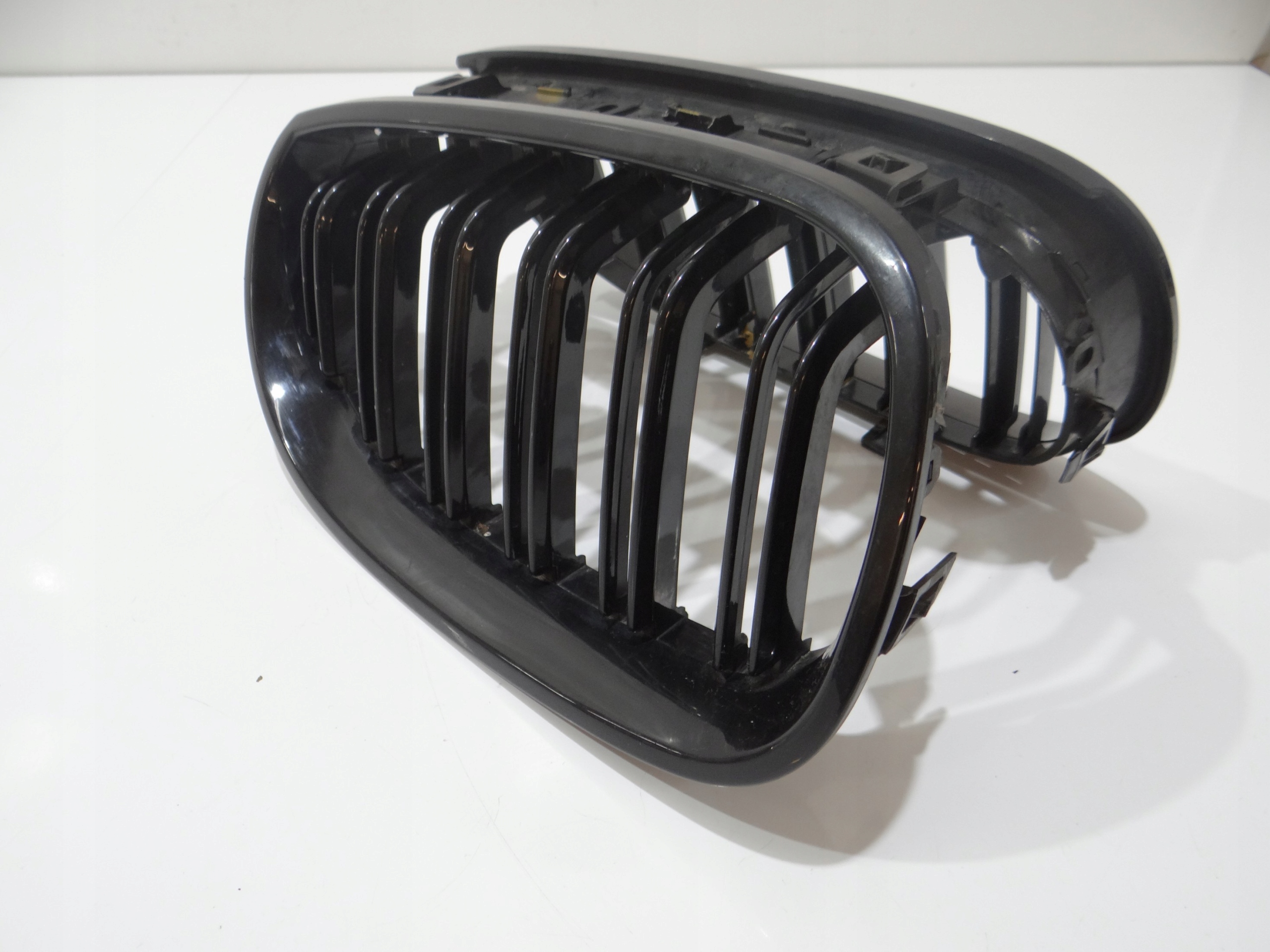 hűtőrács hip pack eleje bal BMW E60 E61 (4273389)
