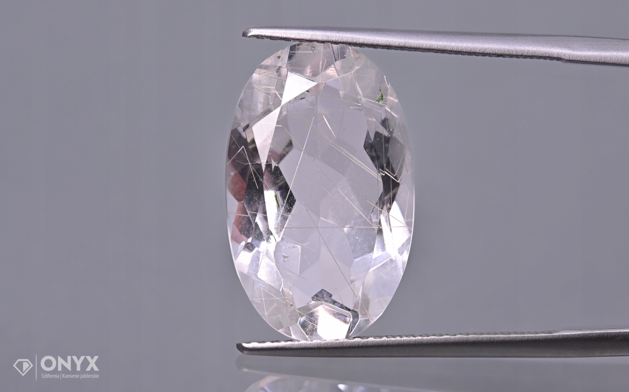 Křemen s rutilem fazetovaný ovál 19x12 mm