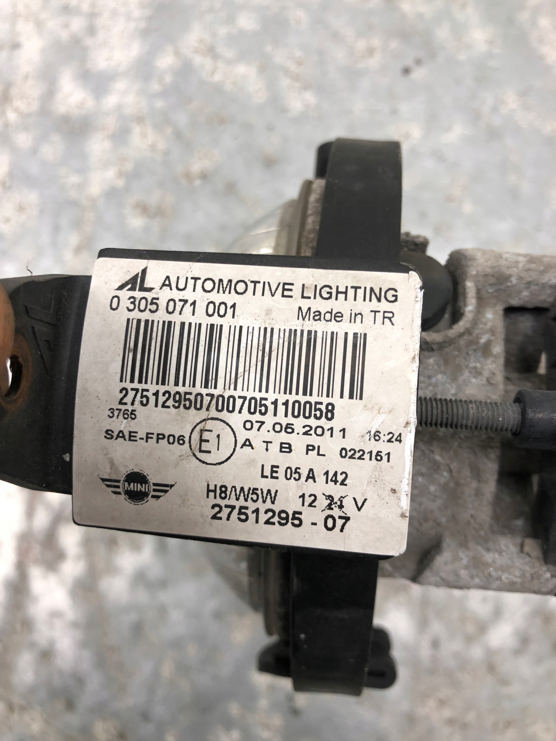 fog light left front MINI R55 2751295