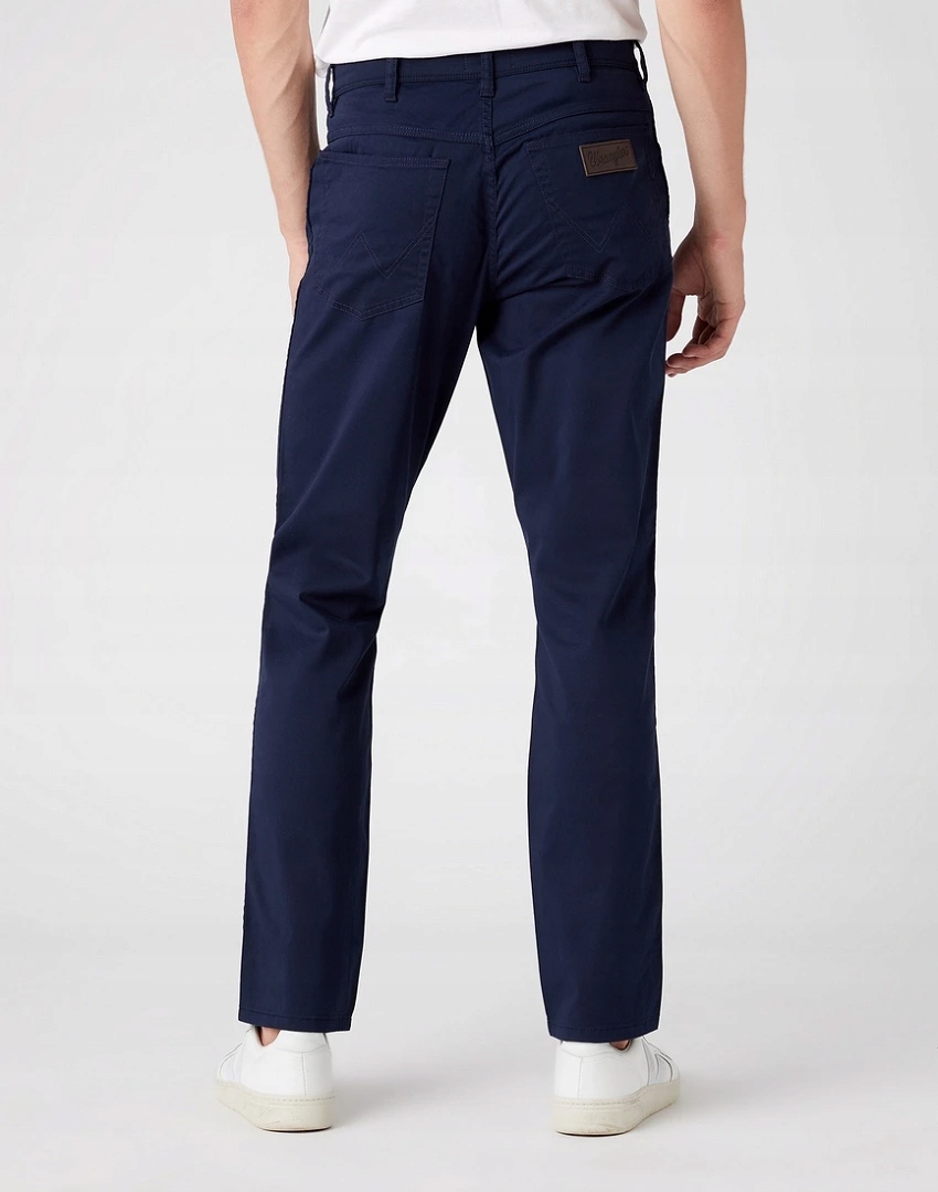 Pánské zúžené džínové kalhoty Wrangler Texas Slim Navy W12SEA114 31/34
