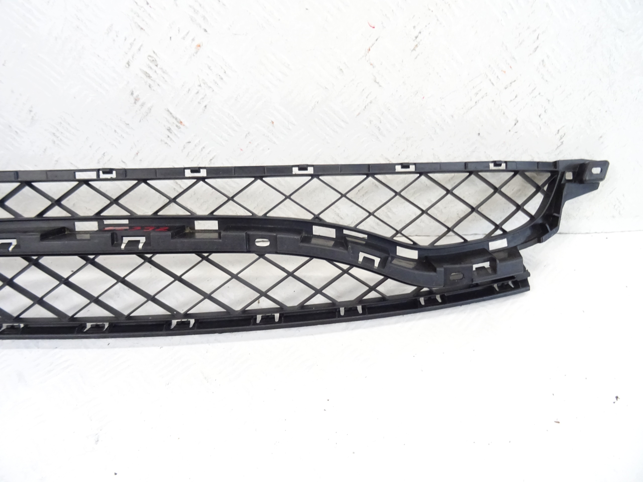 grid of a bumper front central RENAULT CLIO III RS 8200899585