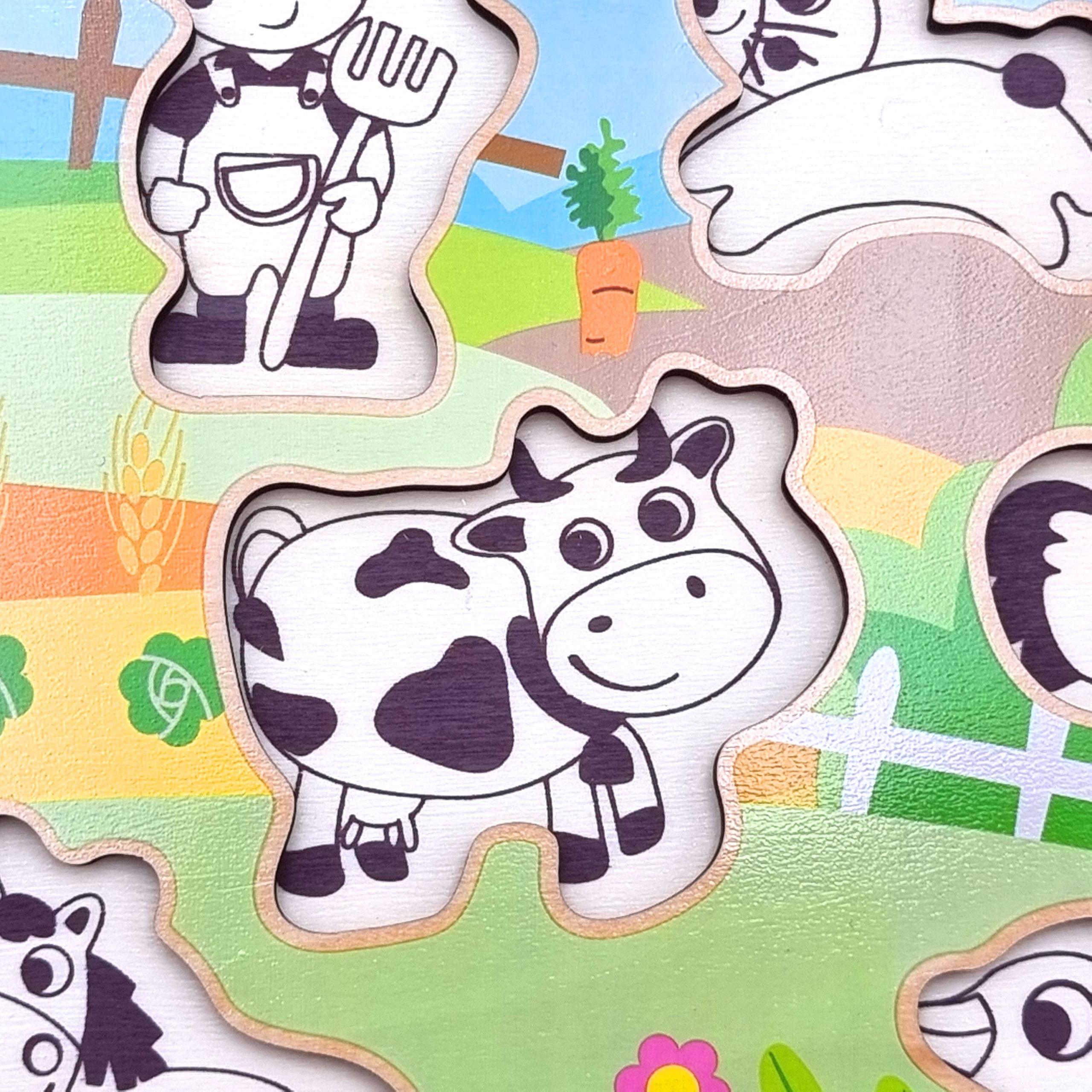 DREWNIANE PUZZLE MONTESSORI FARMA Z PINEZKAMI DOPASUJ KSZTAŁTY TOOKY TOY Kod producenta TY858