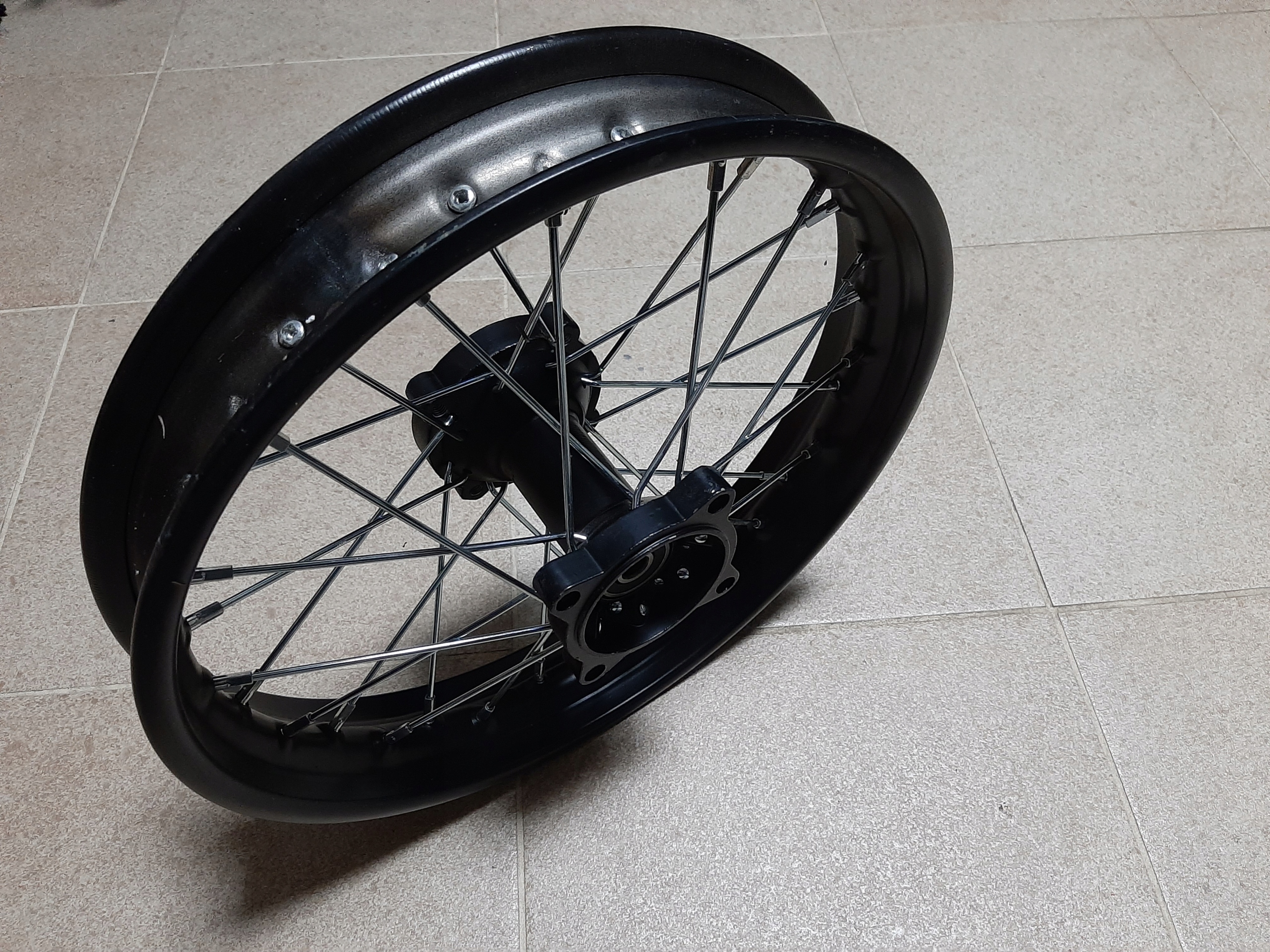 Koło felga 14 cali TYŁ corss 125, 250