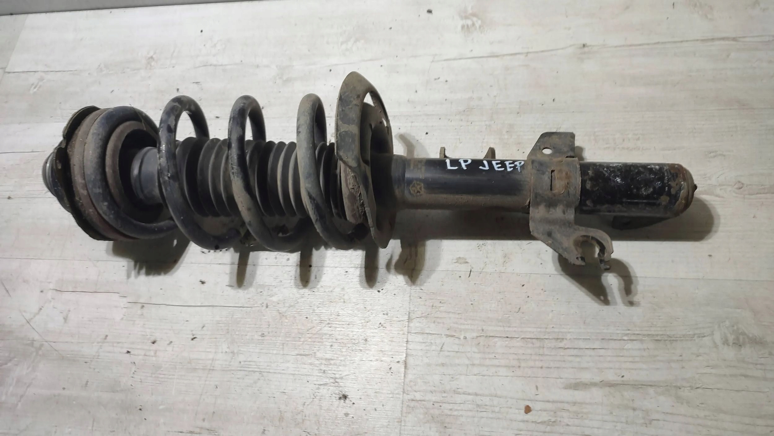 Jeep Cherokee 2015 front side left shock absorber front