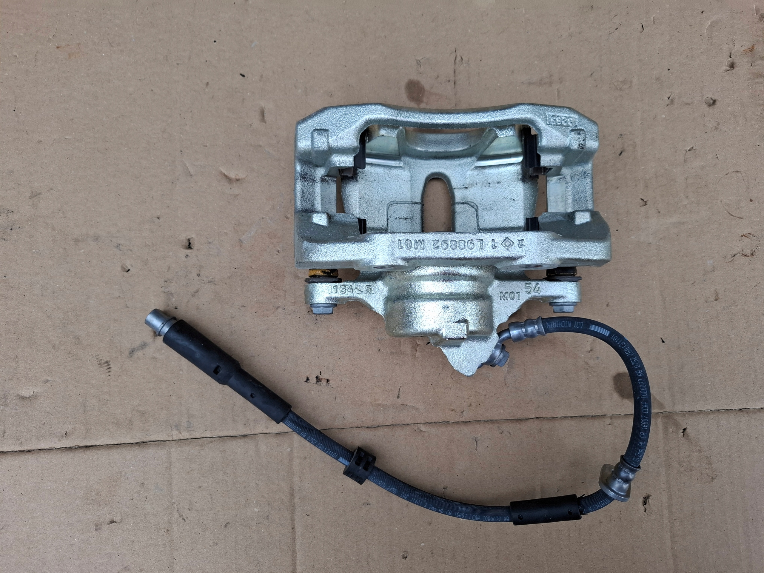 OPEL MOKKA B II 25r caliper brake front 9849001180 new
