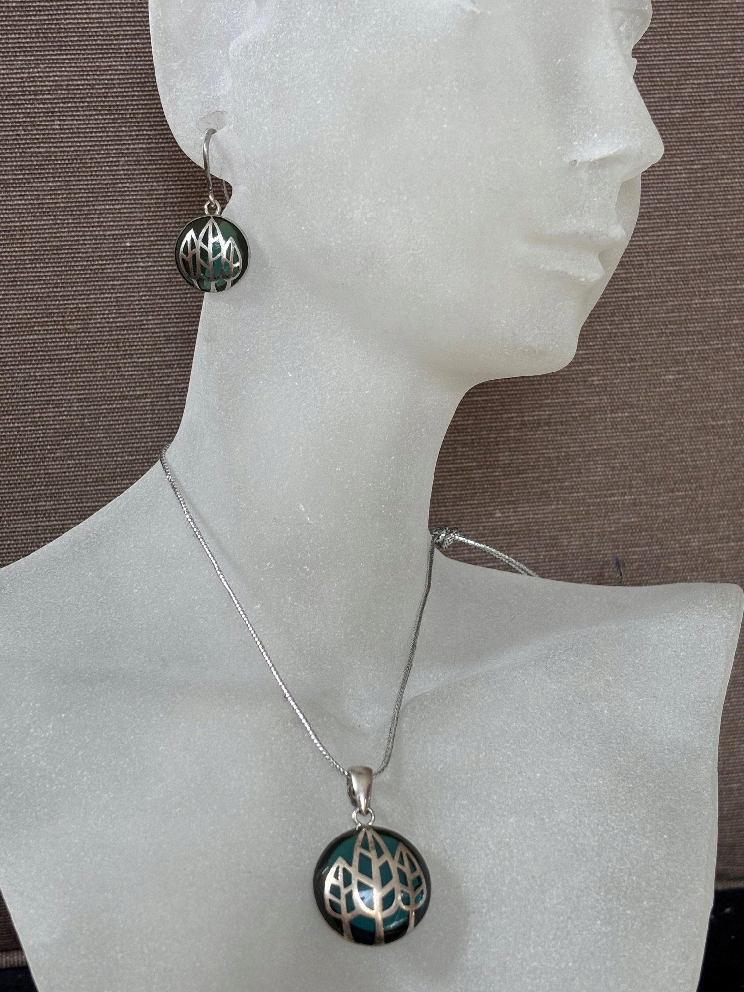 Ażurowa kompozycja w srebrze