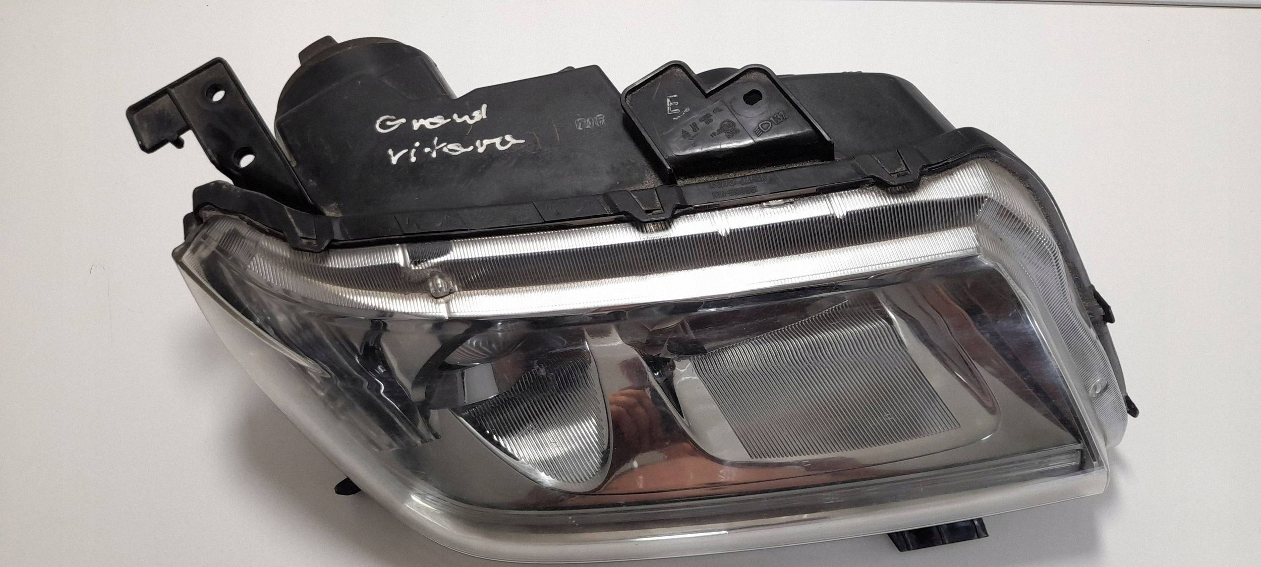 Suzuki Grand Vitara II Reflektor right 10059079 (R463)