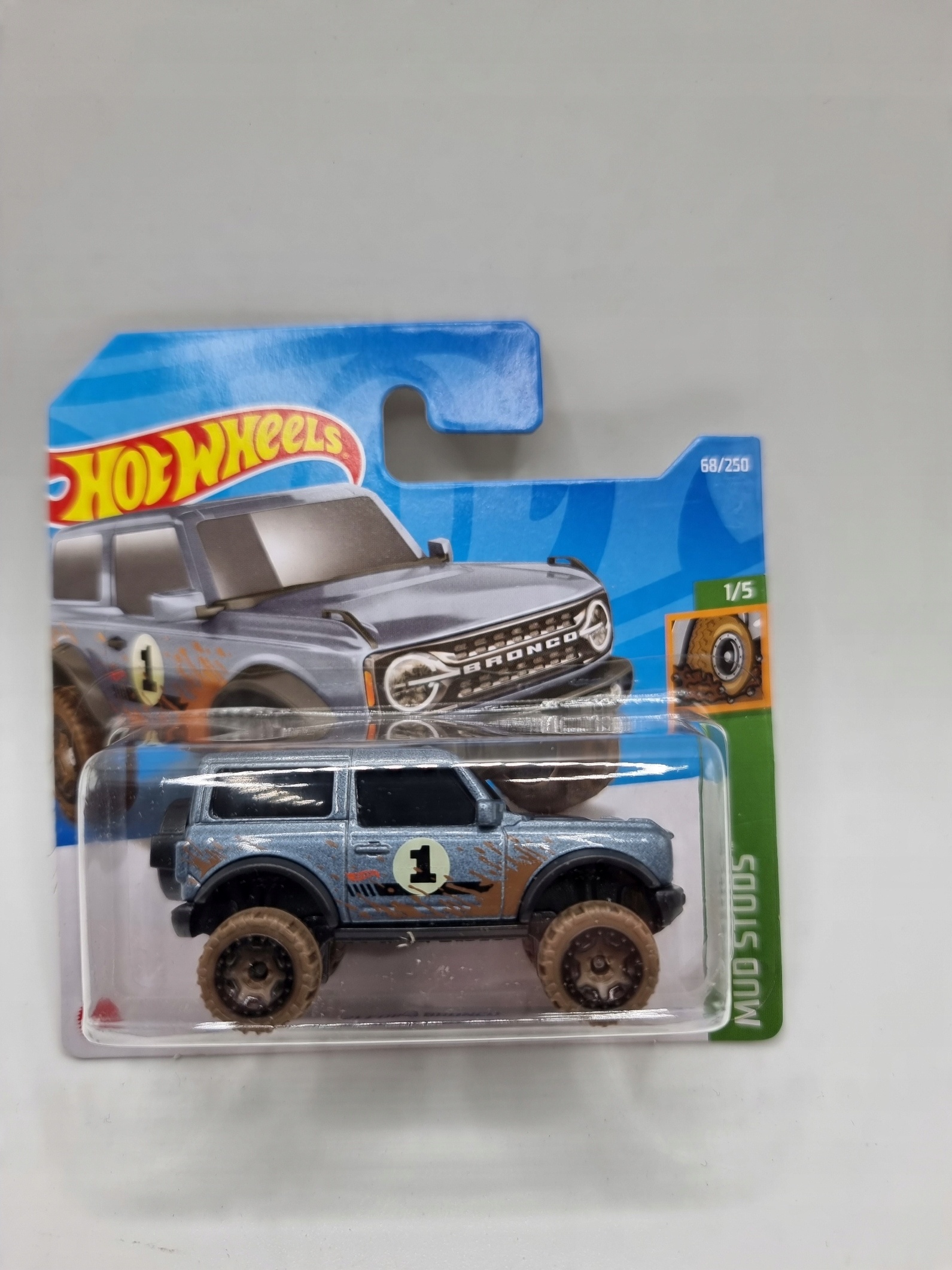 

Hot Wheels 21 Ford Bronco Mud Studs 1/5 1:64 Nowy