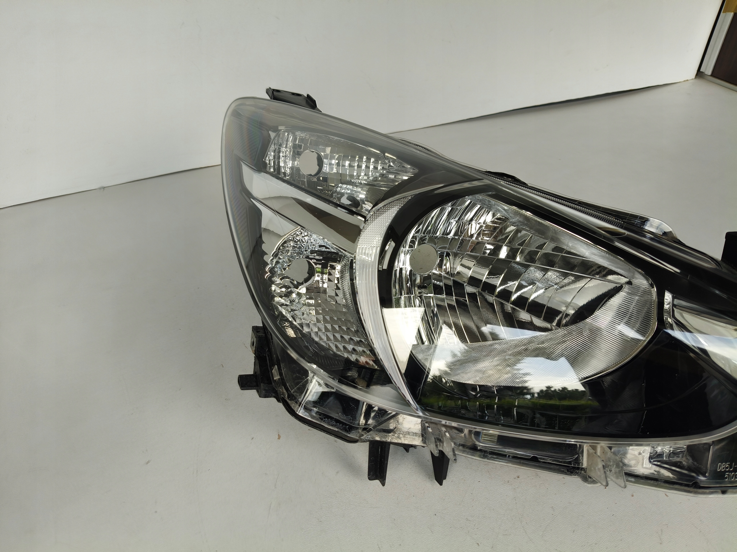 light right REFLEKTOR MAZDA 2 14
