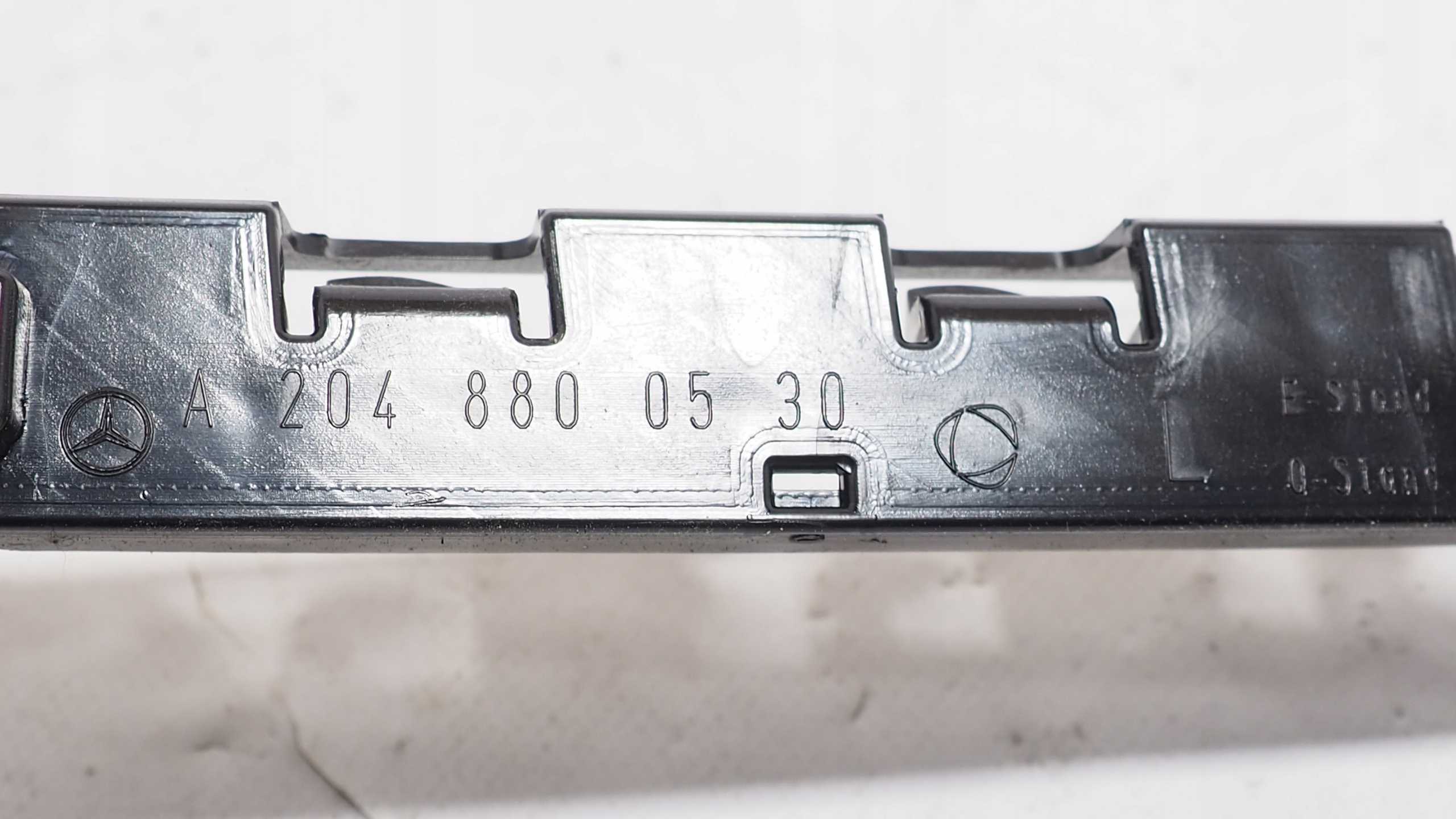 Mercedes C Klasa W204 bumper bracket left rear part A204880530