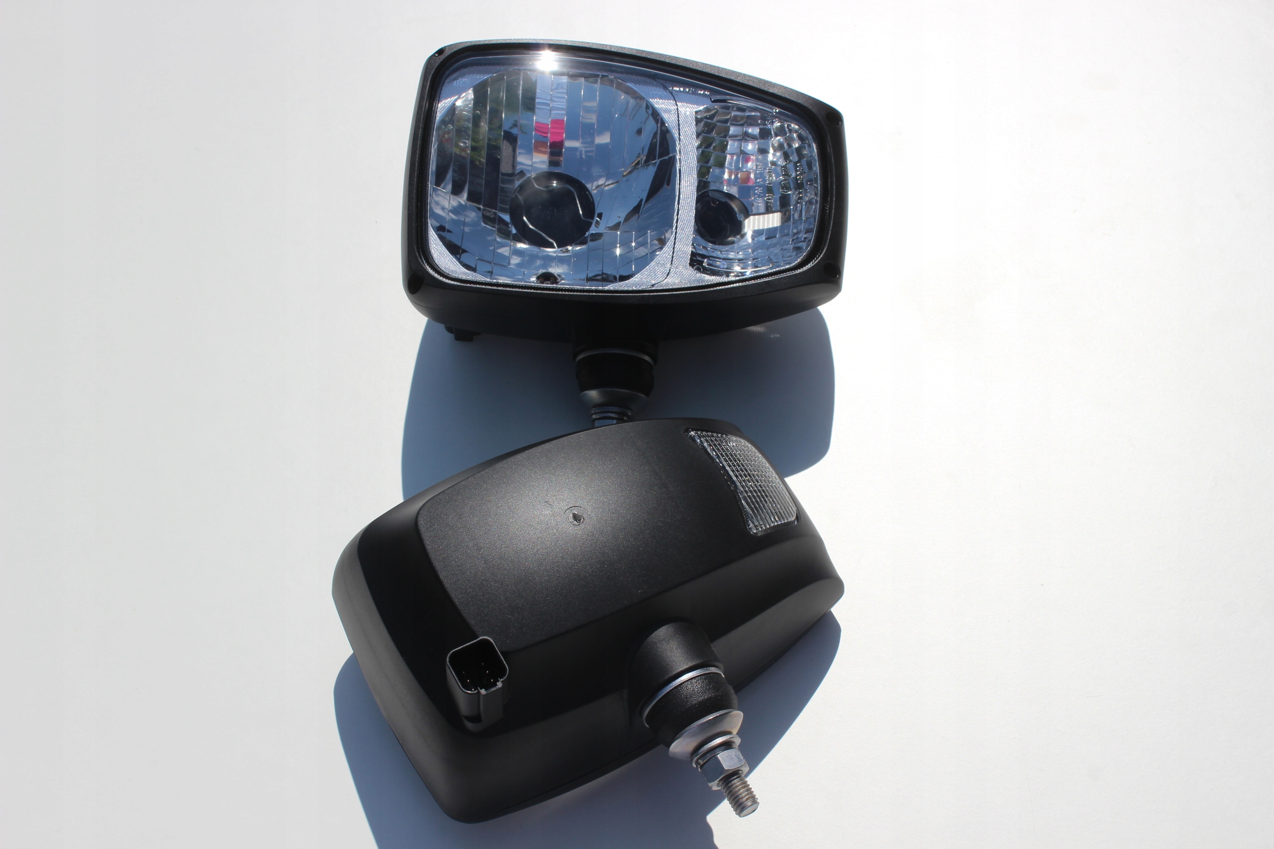 REFLEKTOR LAMPA PRZEDNIA JCB MANITOU CAT CASE LEWY