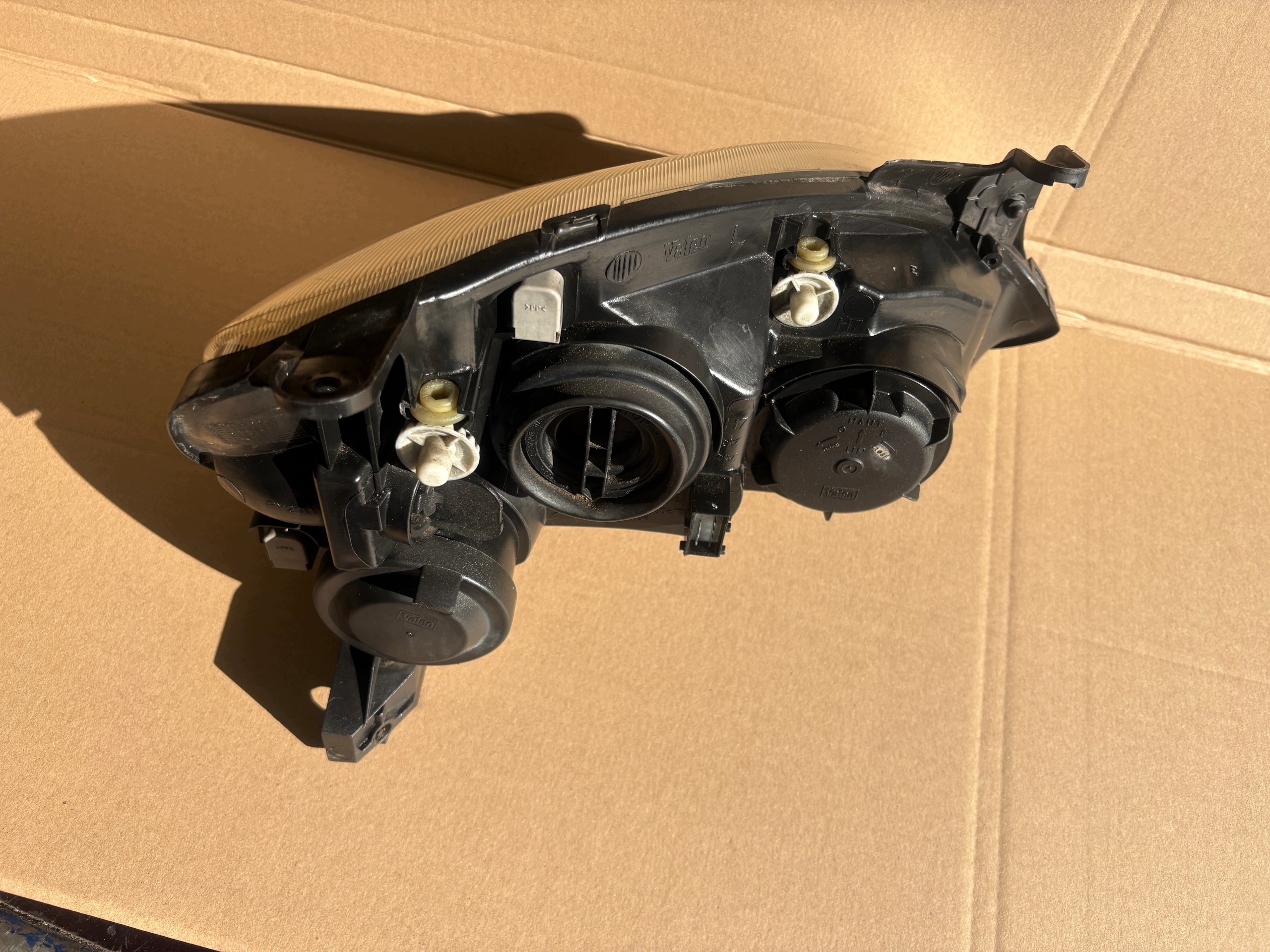 OPEL CORSA C feu gauche avant 09114330 89302111