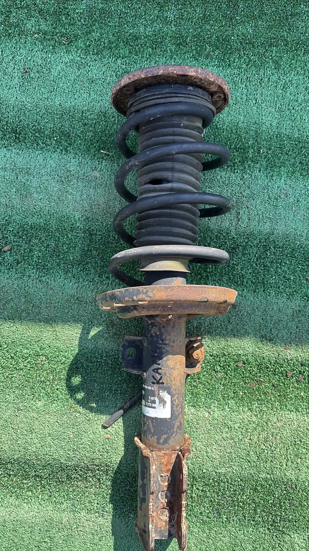 SAAB 93 9-3 shock absorber McPherson spring left front 12773308