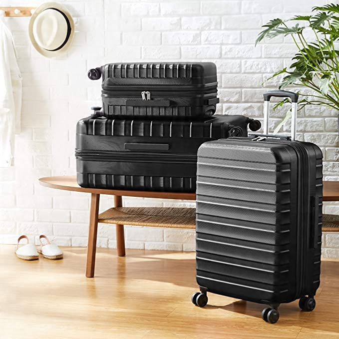 BAGAŻ Z ABS WALIZKA 100L POJEMNA AMAZON BASICS Модель AmazonBasics