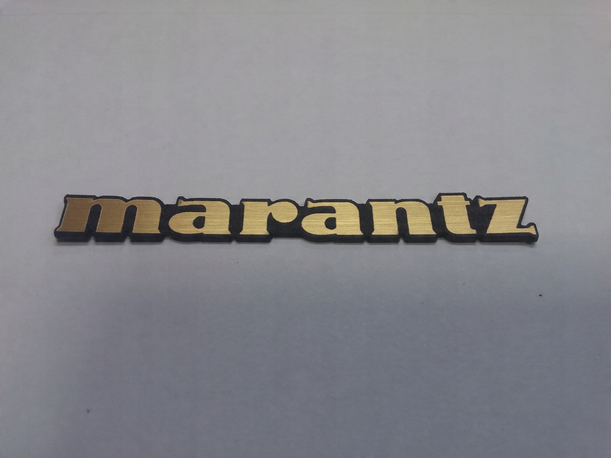

Marantz naklejka emblemat 64 x 8 mm *złota