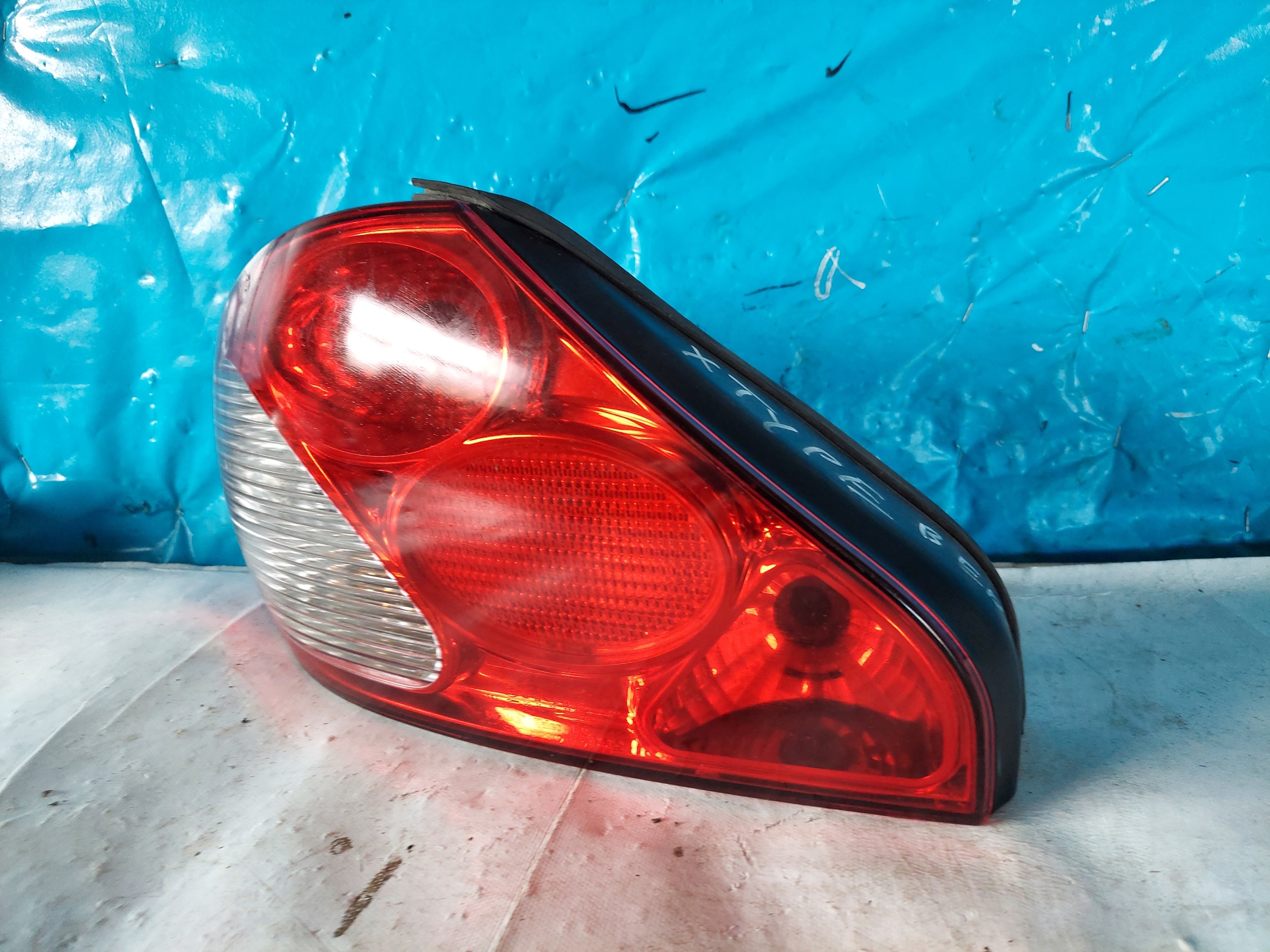 light JAGUAR X-TYPE SEDANA left rear part