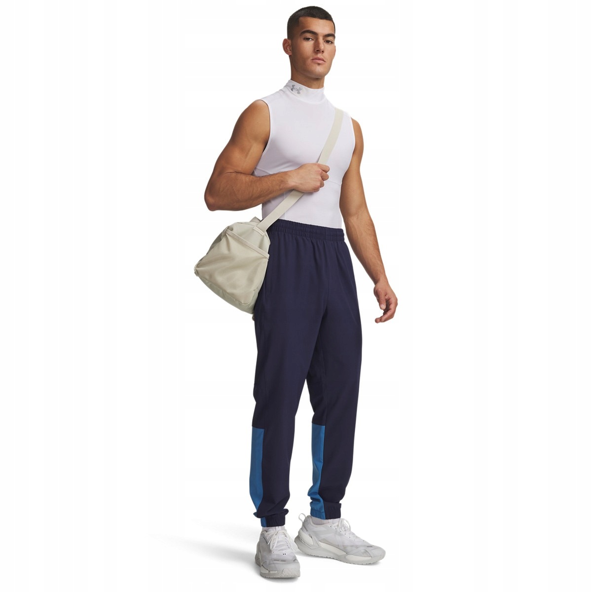 Męskie spodnie treningowe Under Armour Tech Utility Woven Pant Granatowy