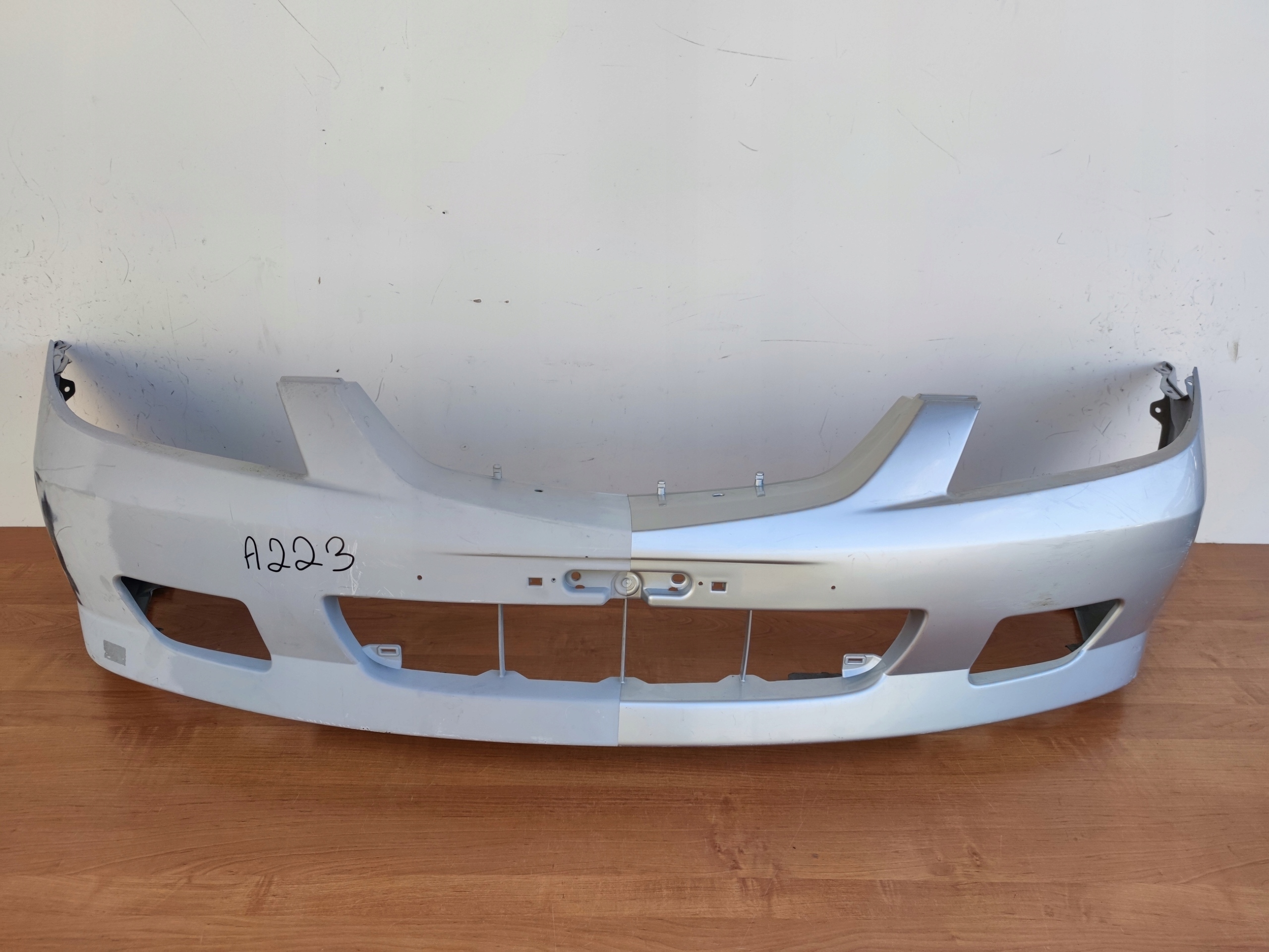 MAZDA 323 LIFT 01-03 ROK bumper front original