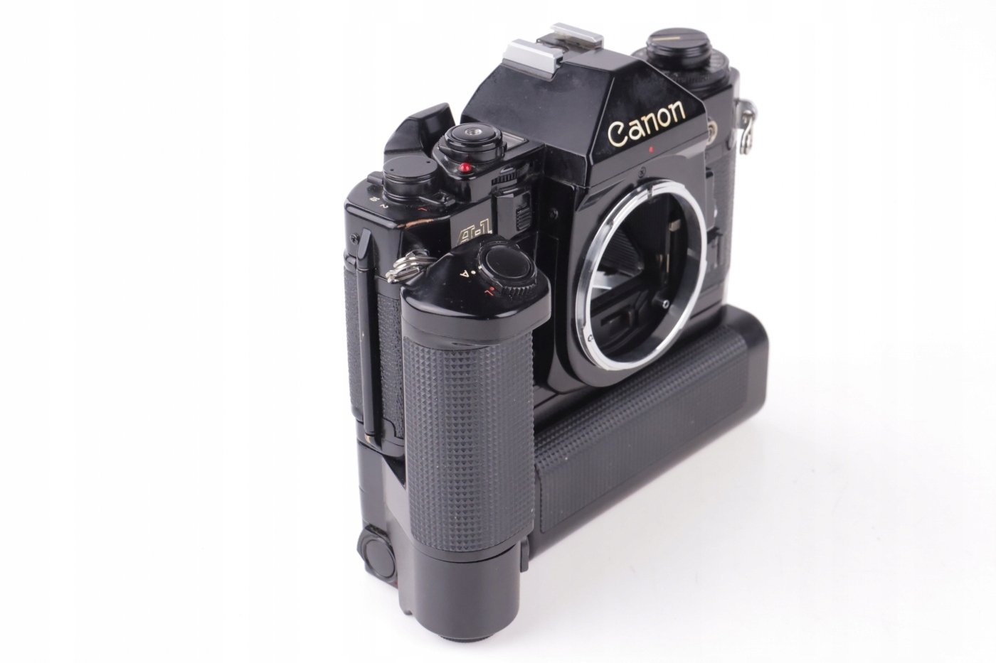 Analogový Canon A-1 body + Motor Drive MA + Battery Pack MA Analogový Canon A-1 body + Motor Drive MA + Battery Pack MA