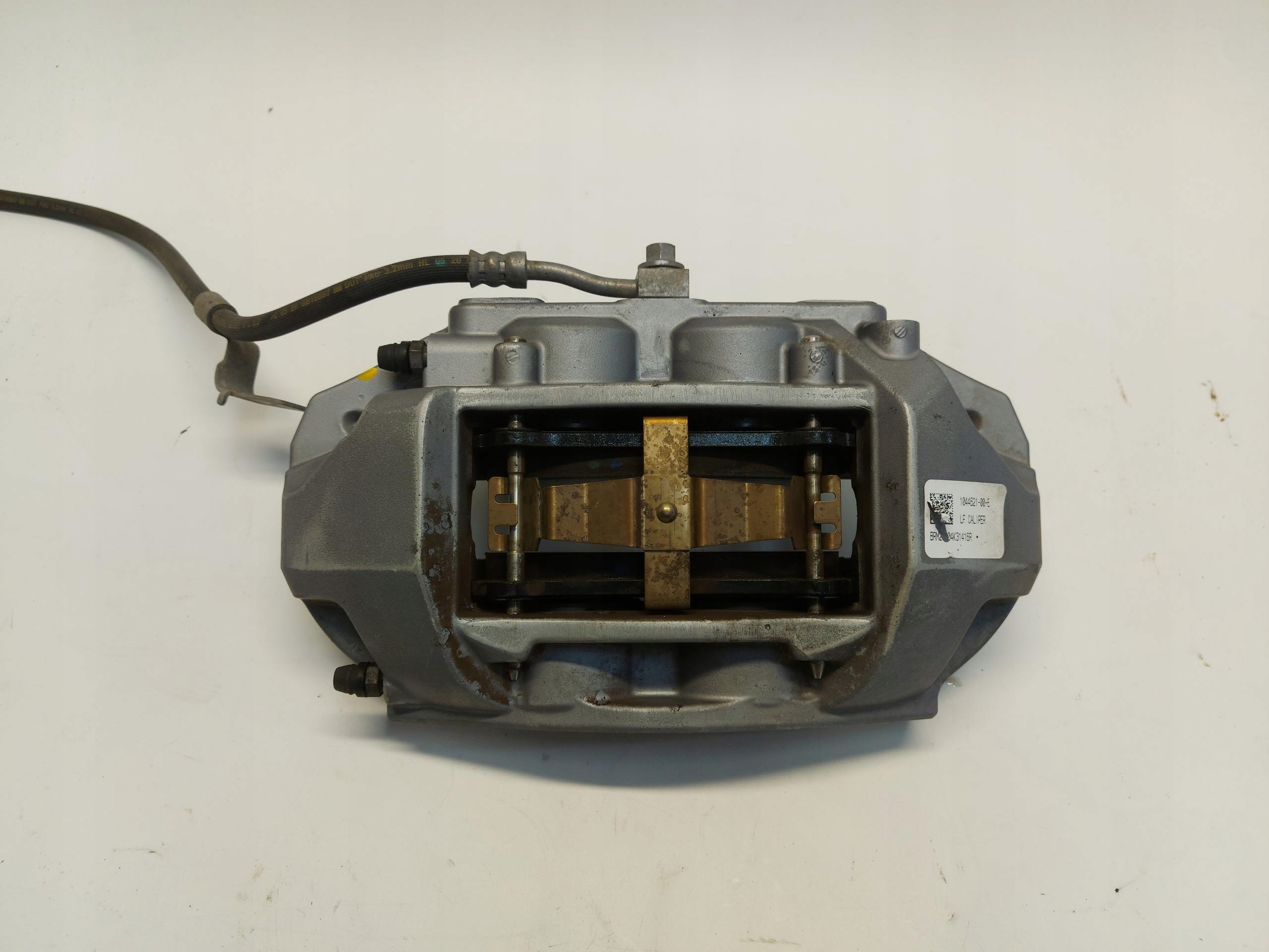 Tesla Model 3 III caliper left front front oryg 104461-00-e